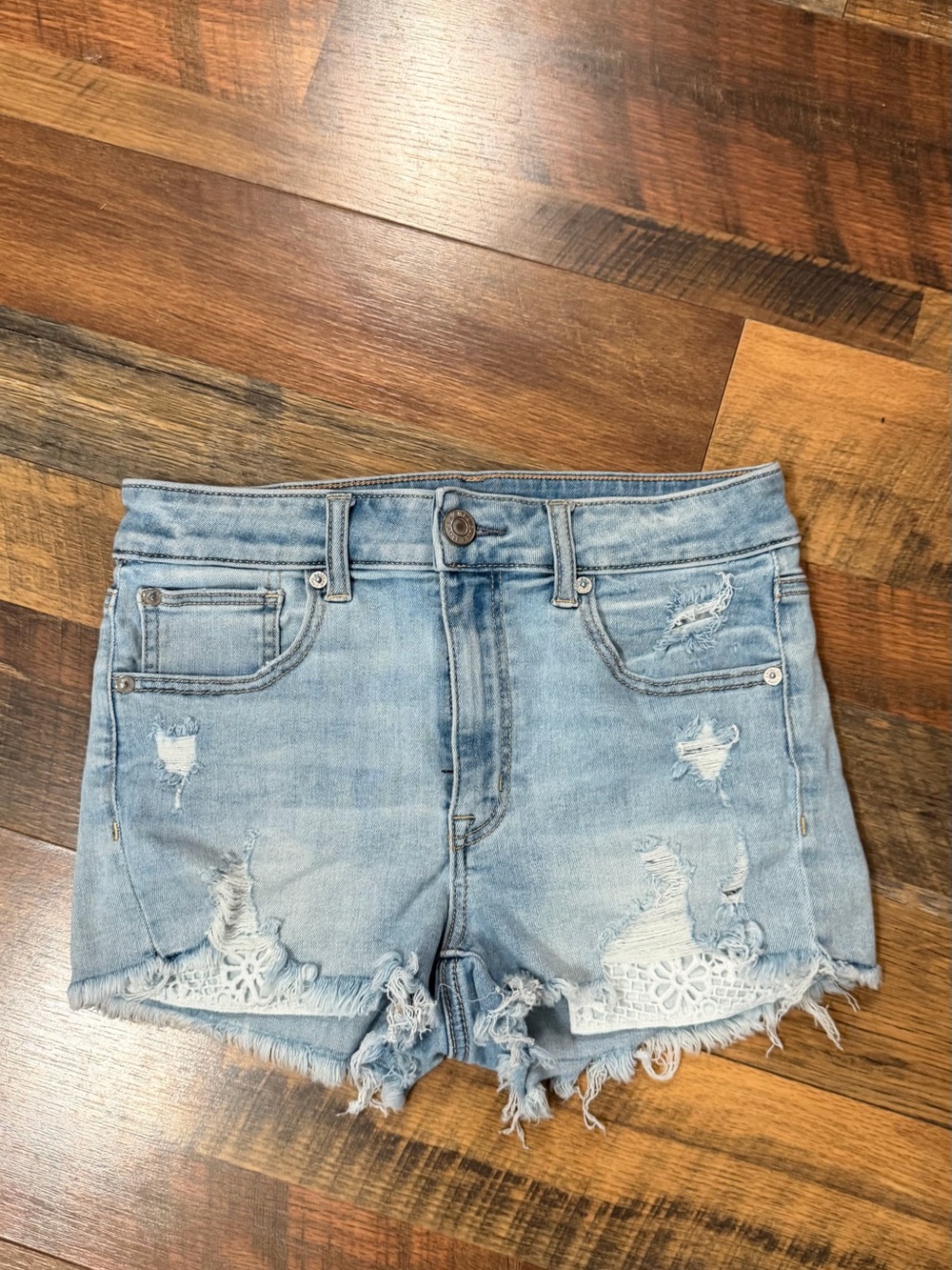 American Eagle Outfitters Light Blue Distressed Denim Shorts with Lace Insets